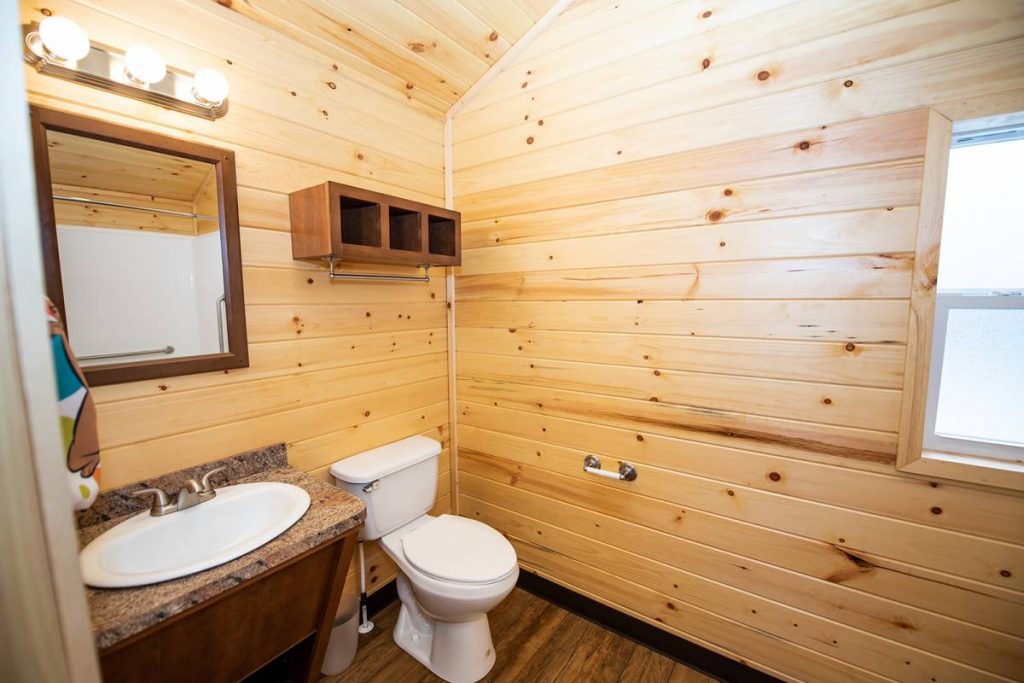 Cindy bear wheelchair access cabin interior, bathroom with mirror, sink, toilet