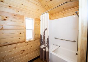 Cindy Bear wheelchair access cabin interior, bathroom with shower and wheelchair-transfer tub