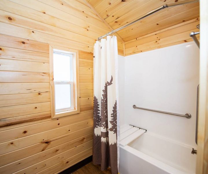 Cindy Bear wheelchair access cabin interior, bathroom with shower and wheelchair-transfer tub